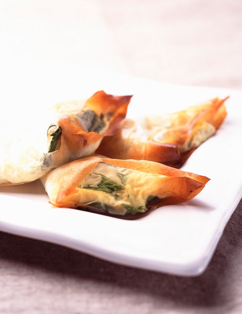 Spinach and cheese filo pastry triangles