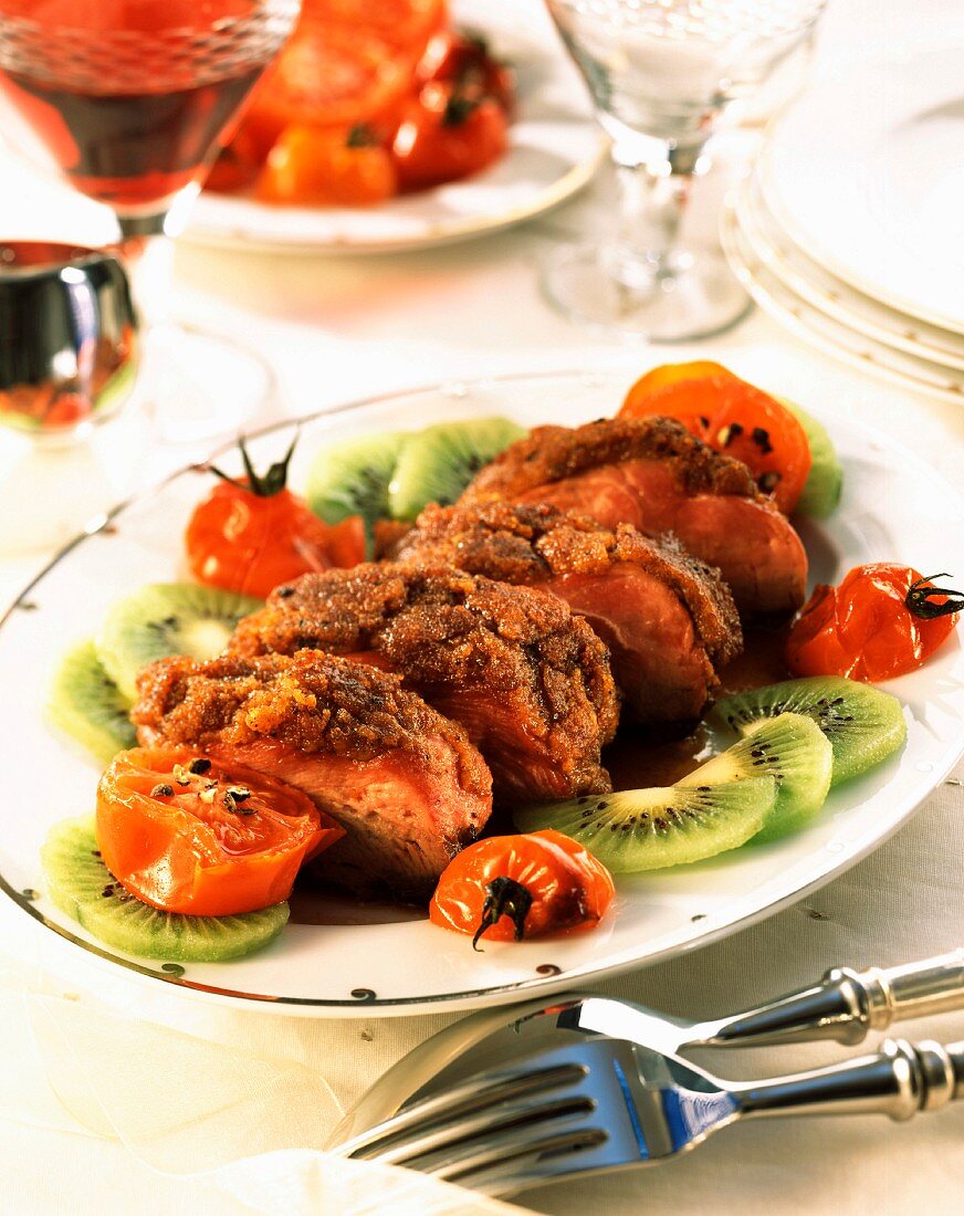 Duck breast covered with gingerbread crumbs and fried