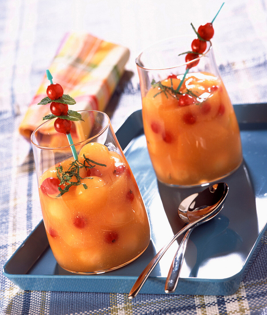 Iced melon soup with honey and redcurrants