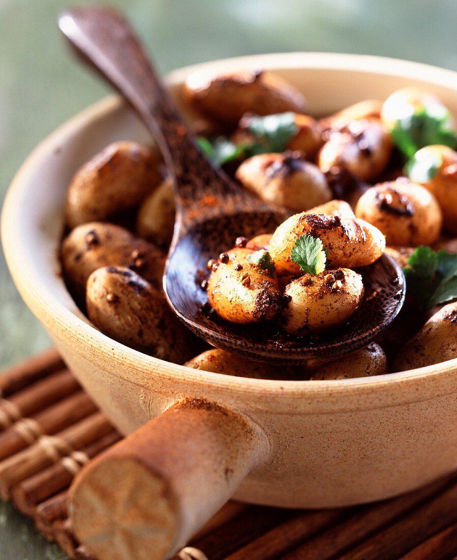 Cooking pot of spiced potatoes