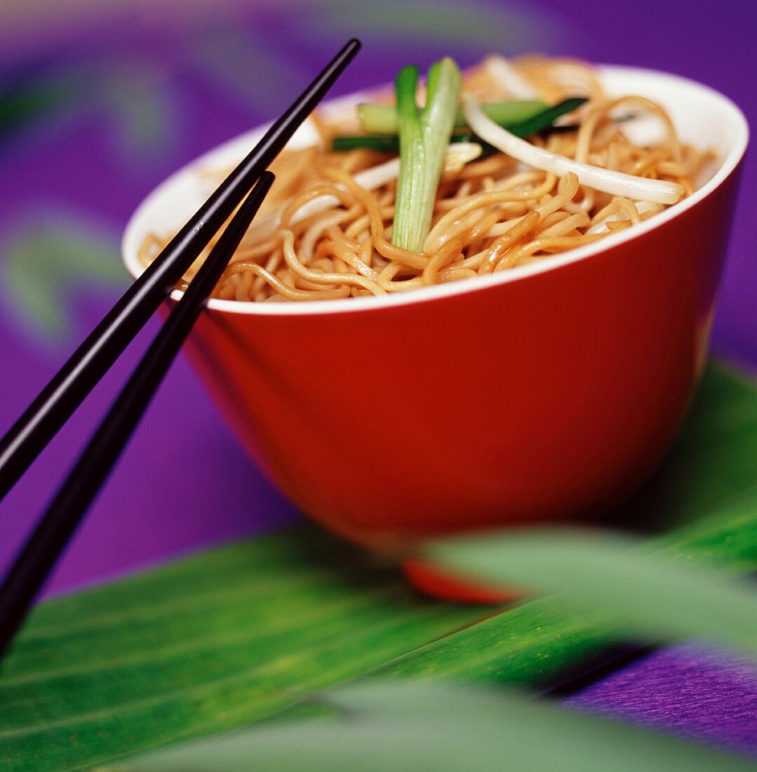 Bowl of Chinese noodles with chopsticks