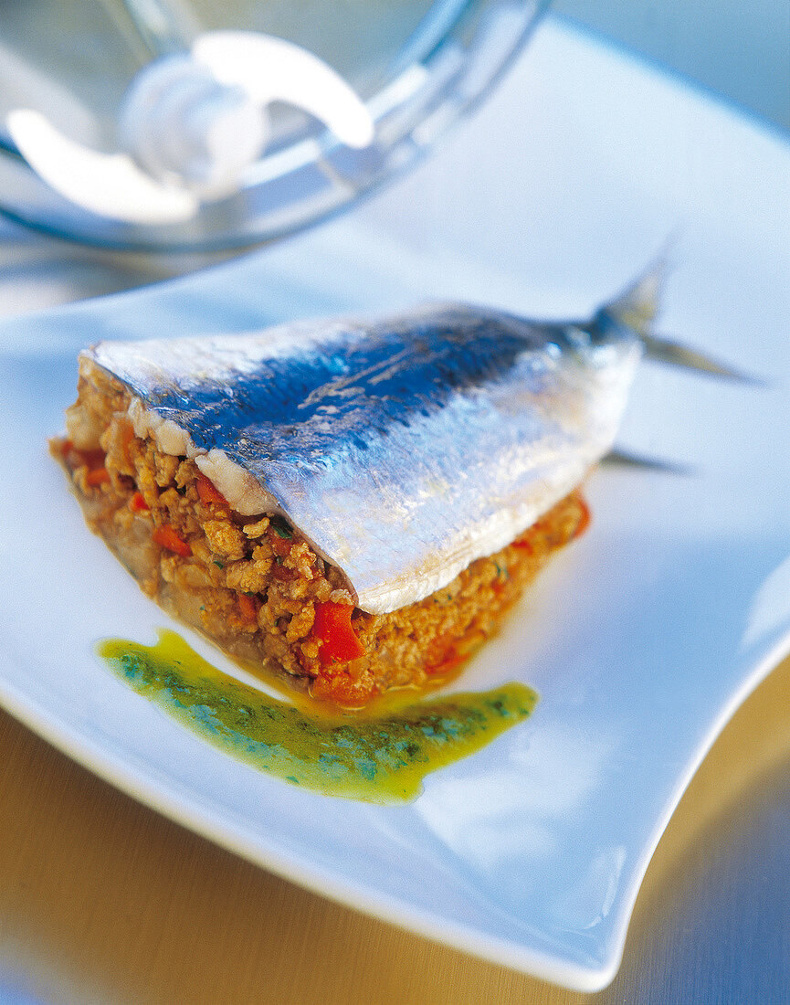 Sardine stuffed with meat and tomato