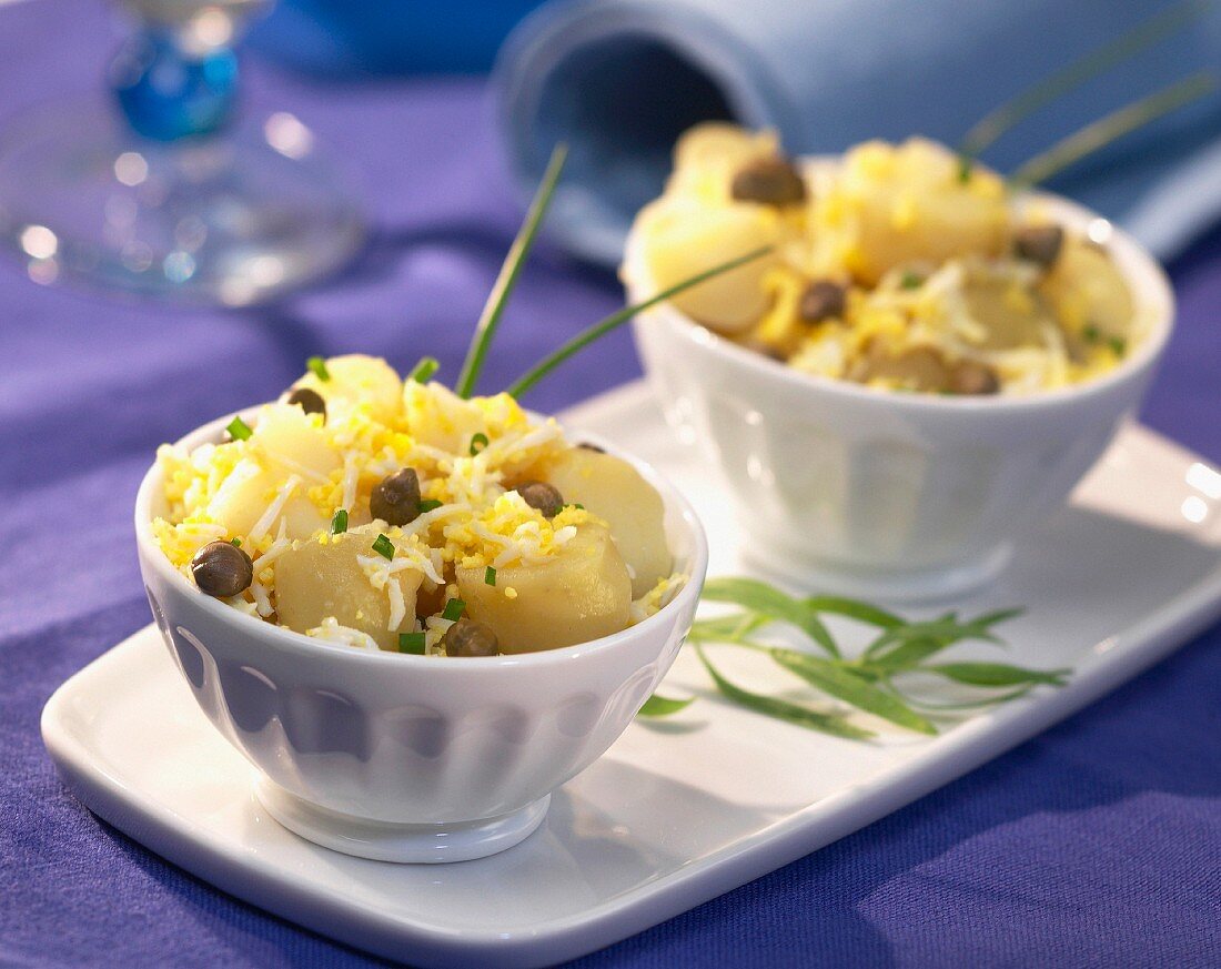 Potato salad with egg mayonnaise and capers