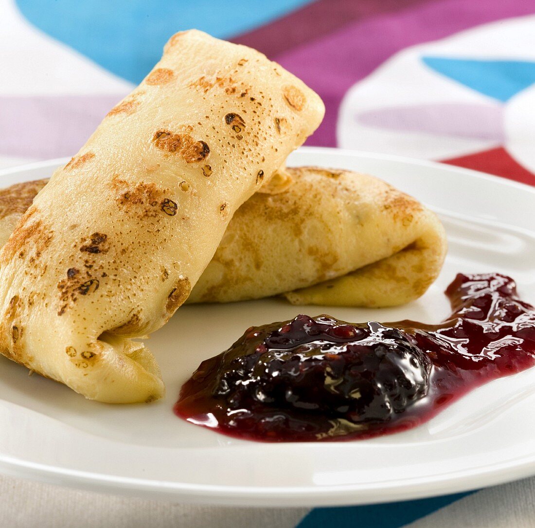 Pancakes with red fruit jam filling