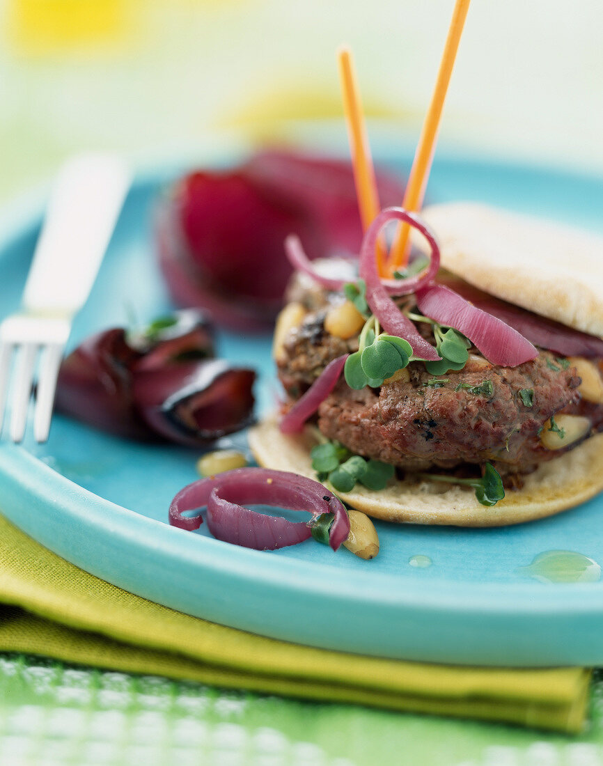 Lamb burger with caramelized red onions