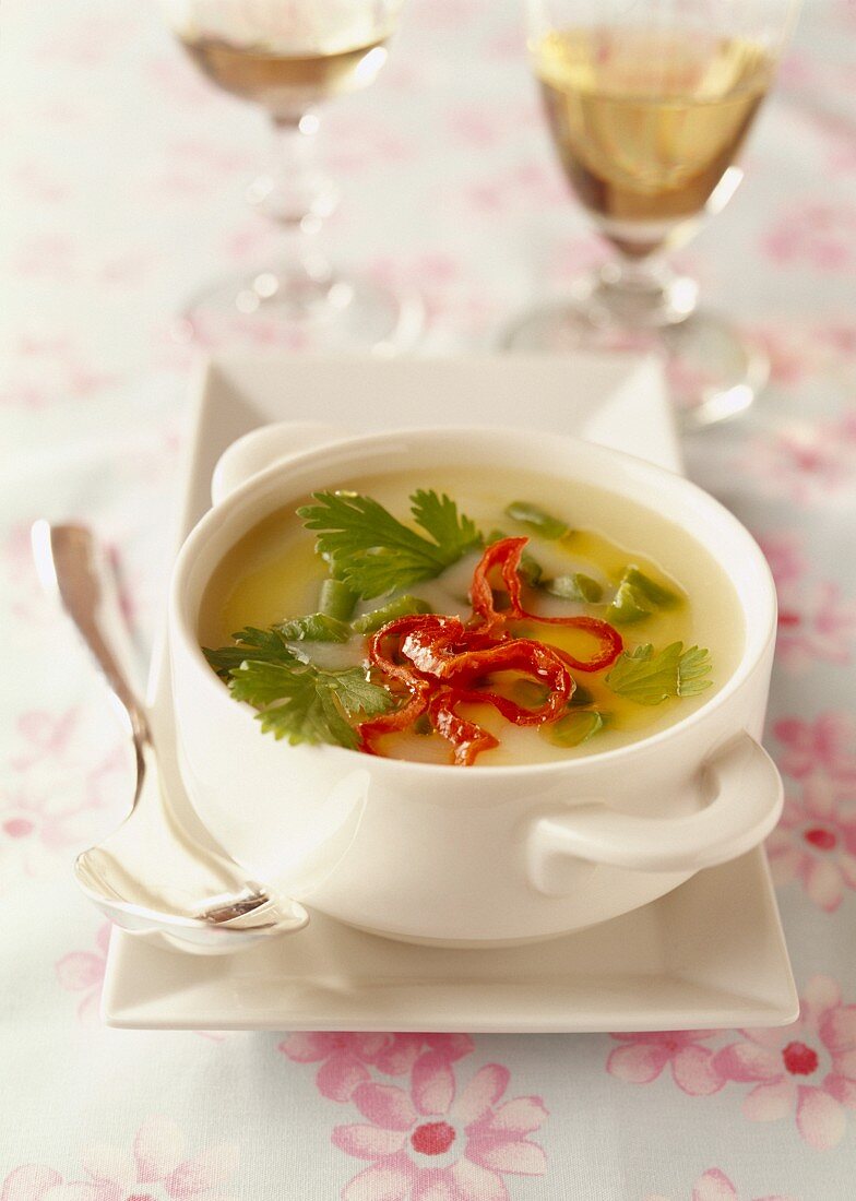 Thai soup with coconut milk, coriander and poultry