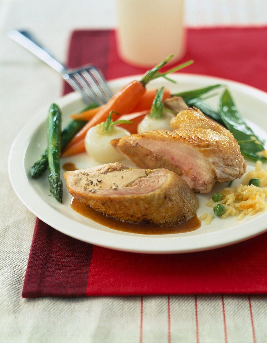 Foie gras-stuffed poultry with baby vegetables