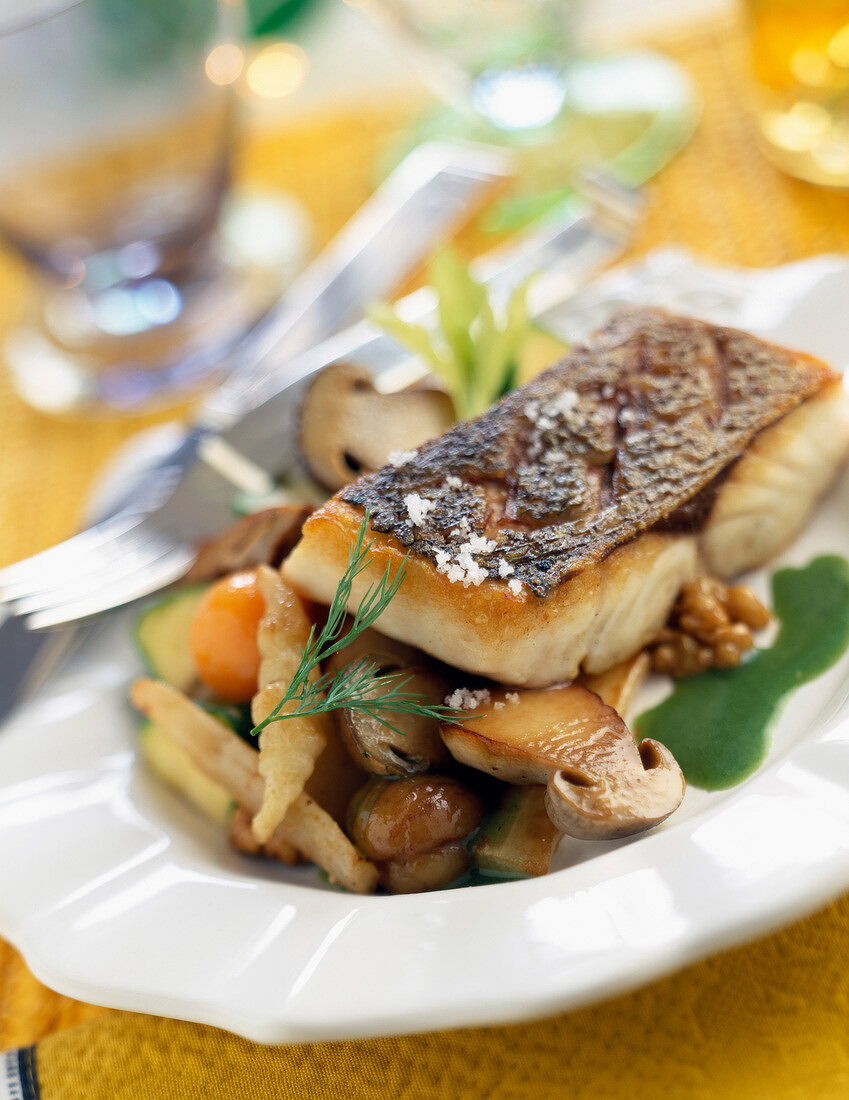 Piece of bass with old-fashioned vegetables