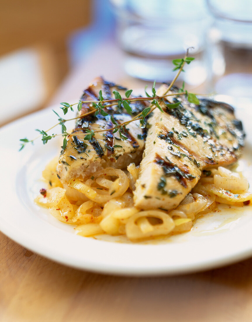 Grilled swordfish with onions and thyme