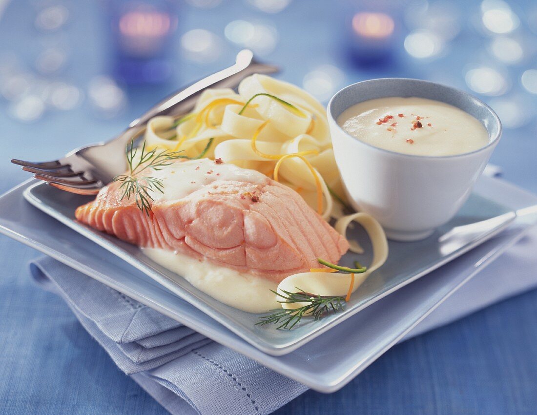 Salmon steak with white butter sauce and vegetable tagliatelle