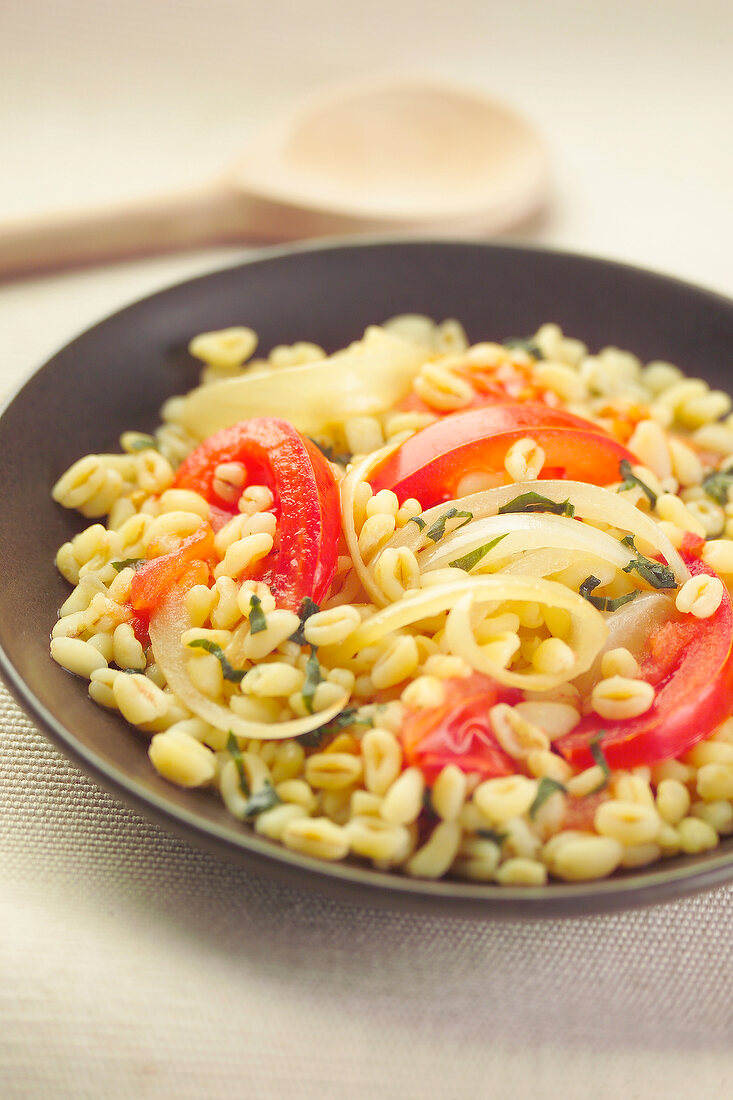 steamed wheat with tomatoes and onions