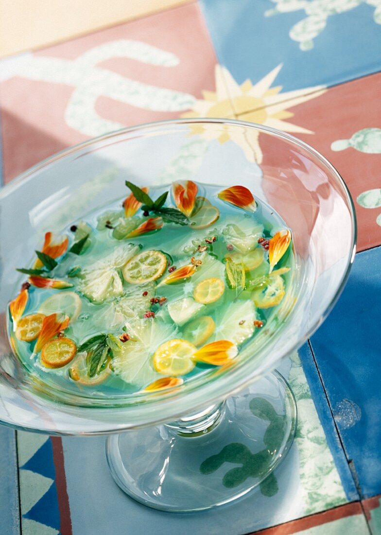 Citrus fruit soup with blue curacao