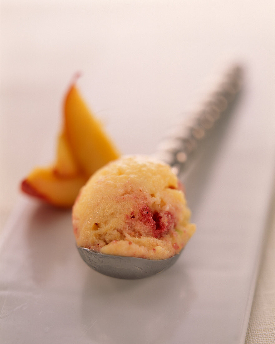 Scoop of raspberry, orange blossom and apricot ice cream
