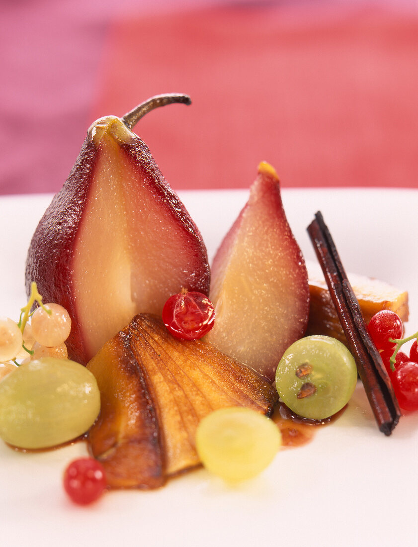 Pears poached in wine and caramelized apple fruit salad