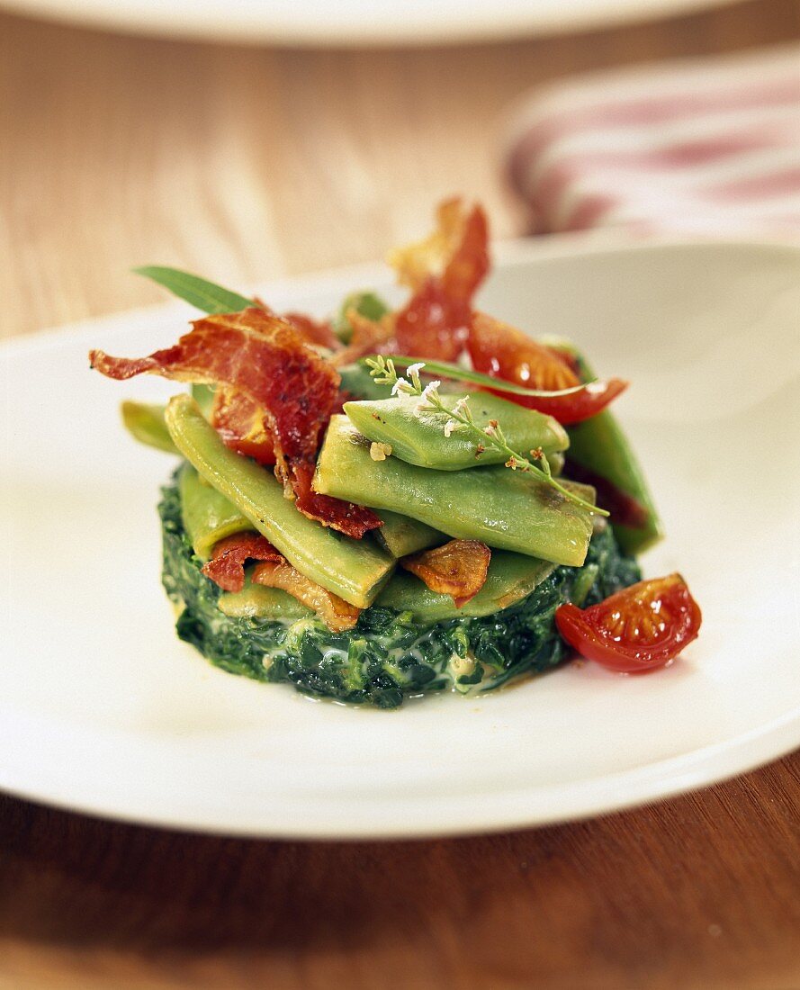 spinach timbale with bacon and vegetables