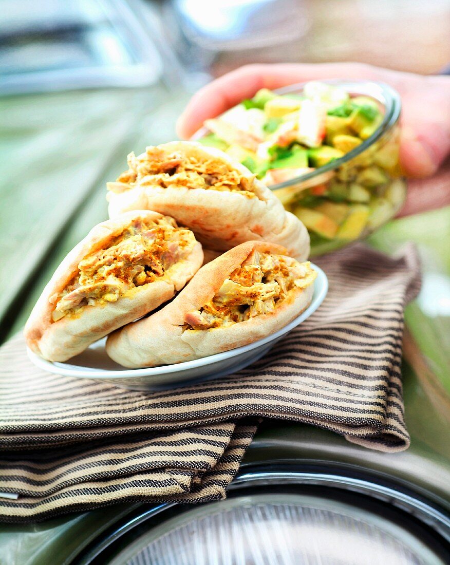 Chicken pita sandwich with avocado salad