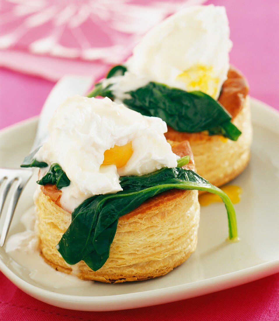 Puff pastry case filled with poached eggs and spinach