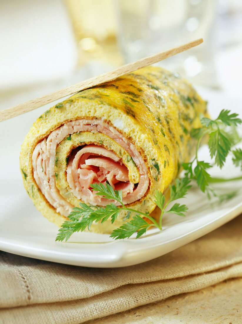 Rolled omelette with ham,curry and fresh herbs (topic : omelettes)