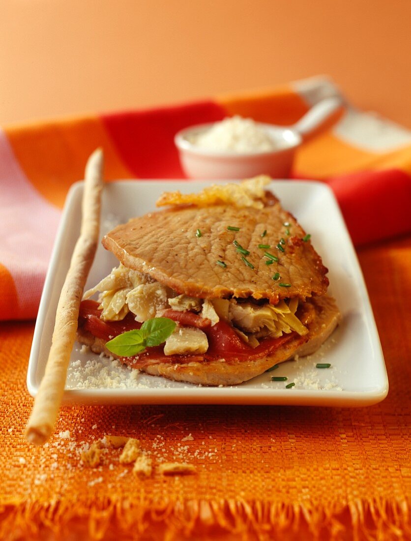 Gefülltes Kalbsschnitzel mit Artischocken und Parmesan