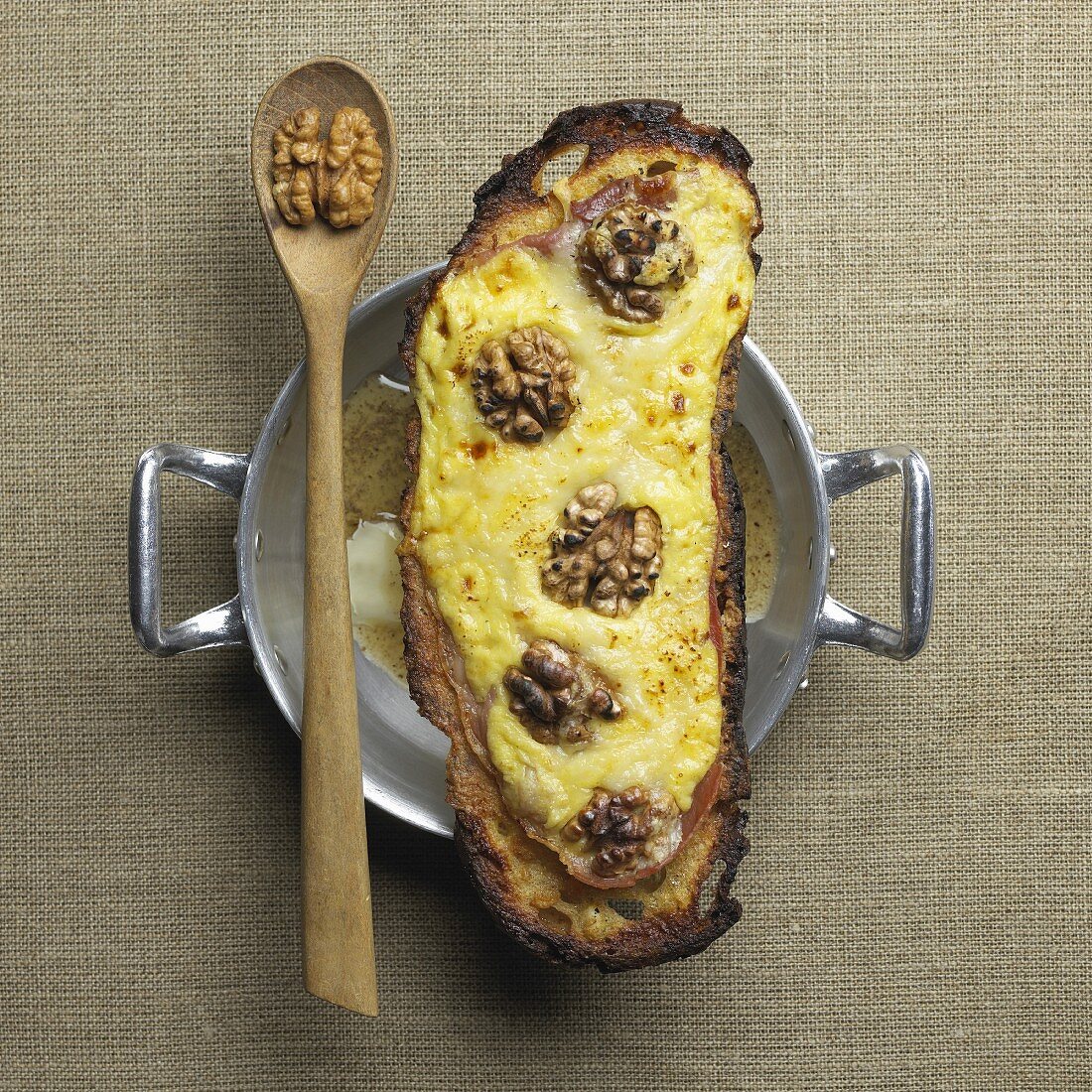 Savoie cheese on toast with walnuts