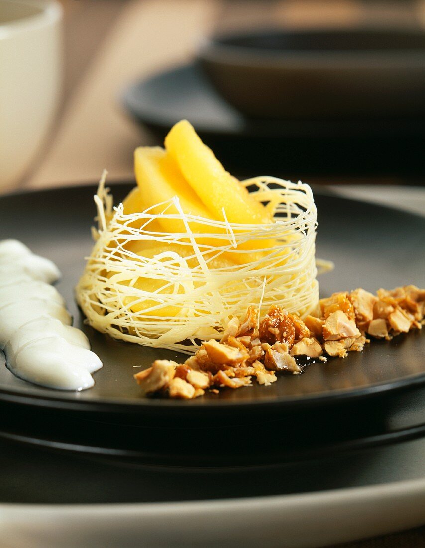 pear nest with white chocolate and crushed hazelnuts