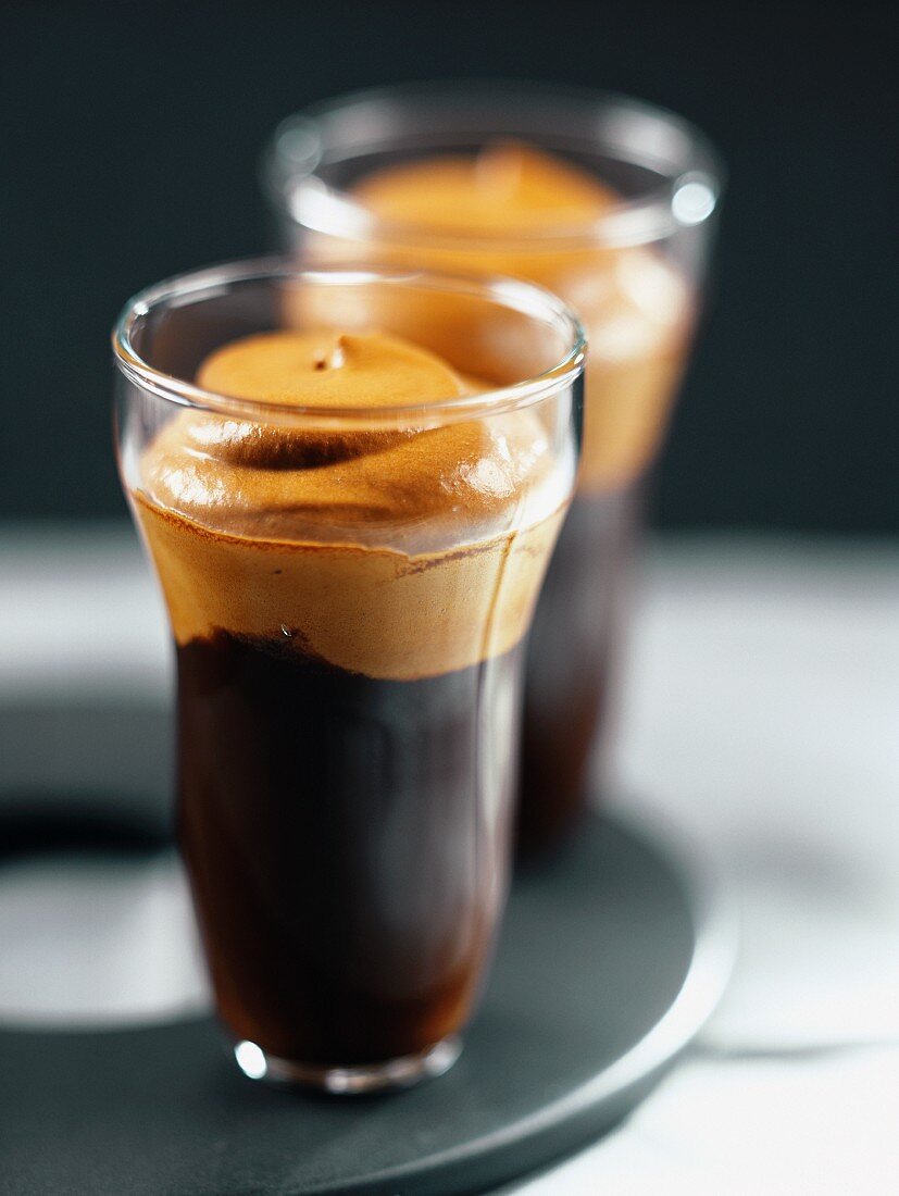 Glasses of espresso with coffee cream