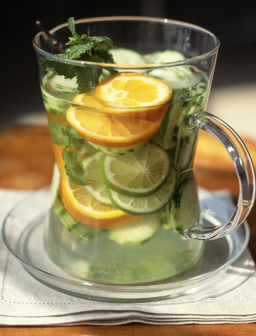 Jug of fresh citrus fruit cocktail