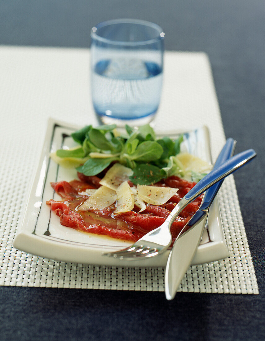 Beef carpaccio with parmesan and lamb's lettuce