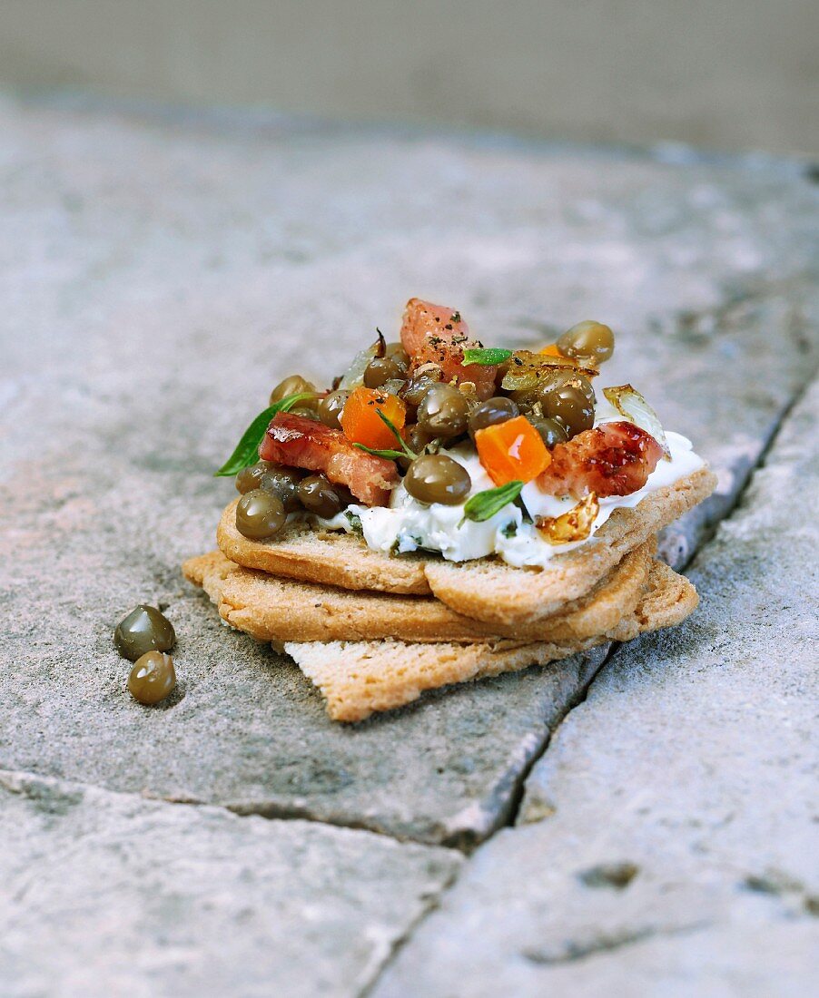 Petit salé bacon and lentil canapé