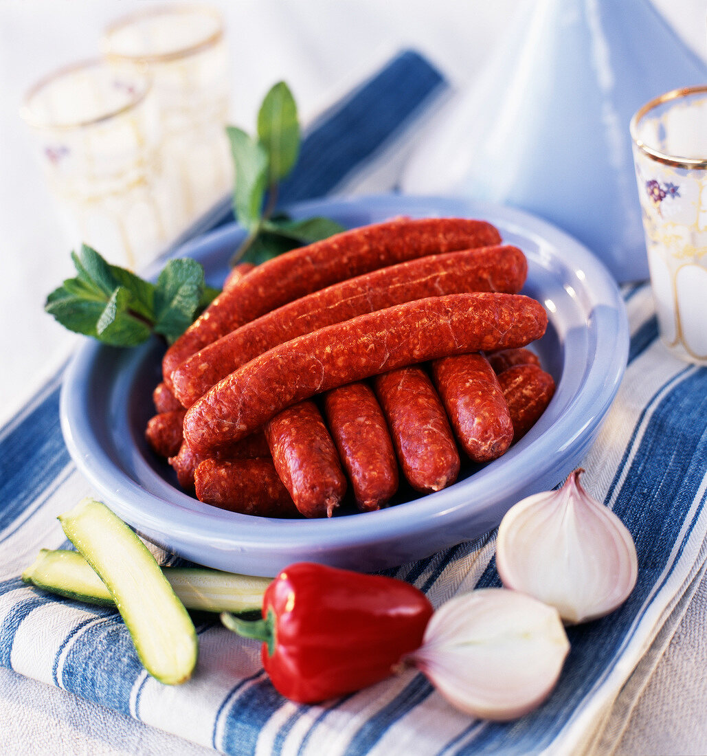 Raw merguez sausages