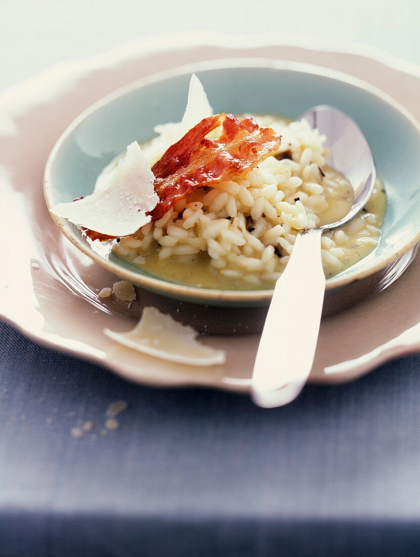 Creamy risotto with truffles and crunchy bacon