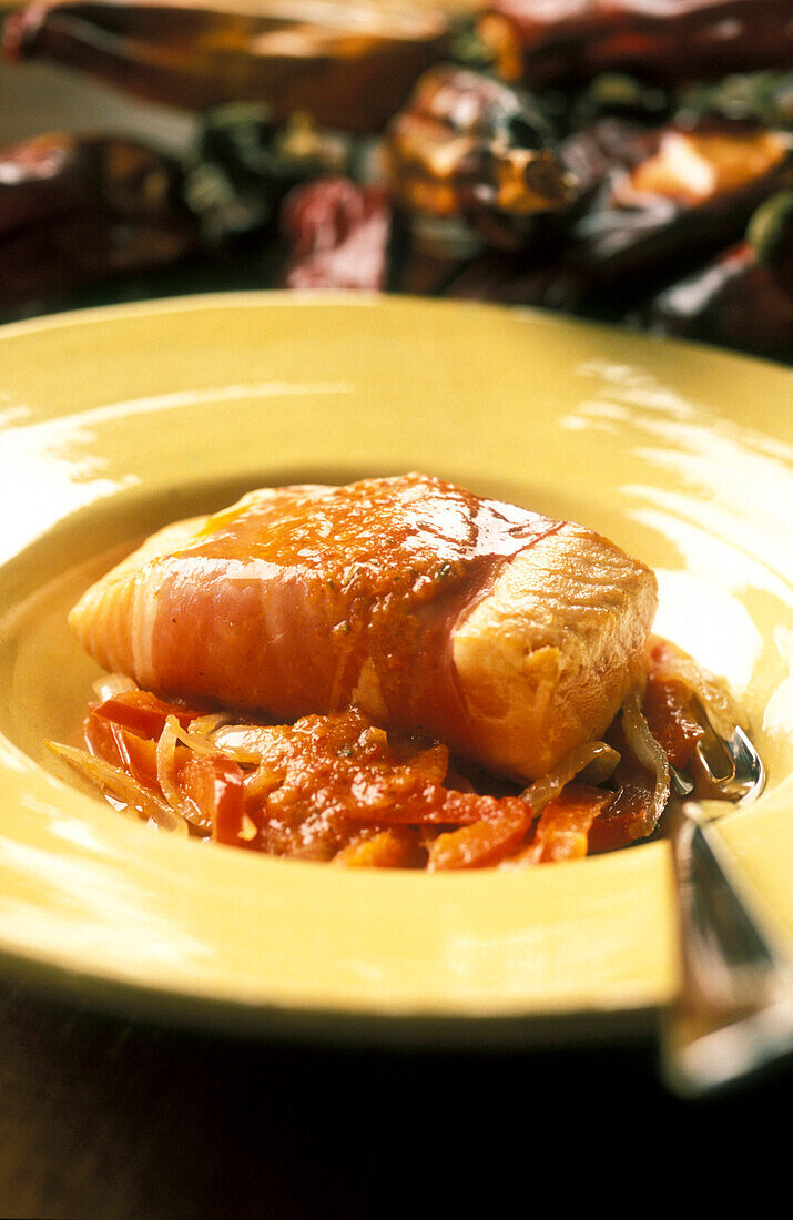 Salmon escalopes with ham and piperade butter
