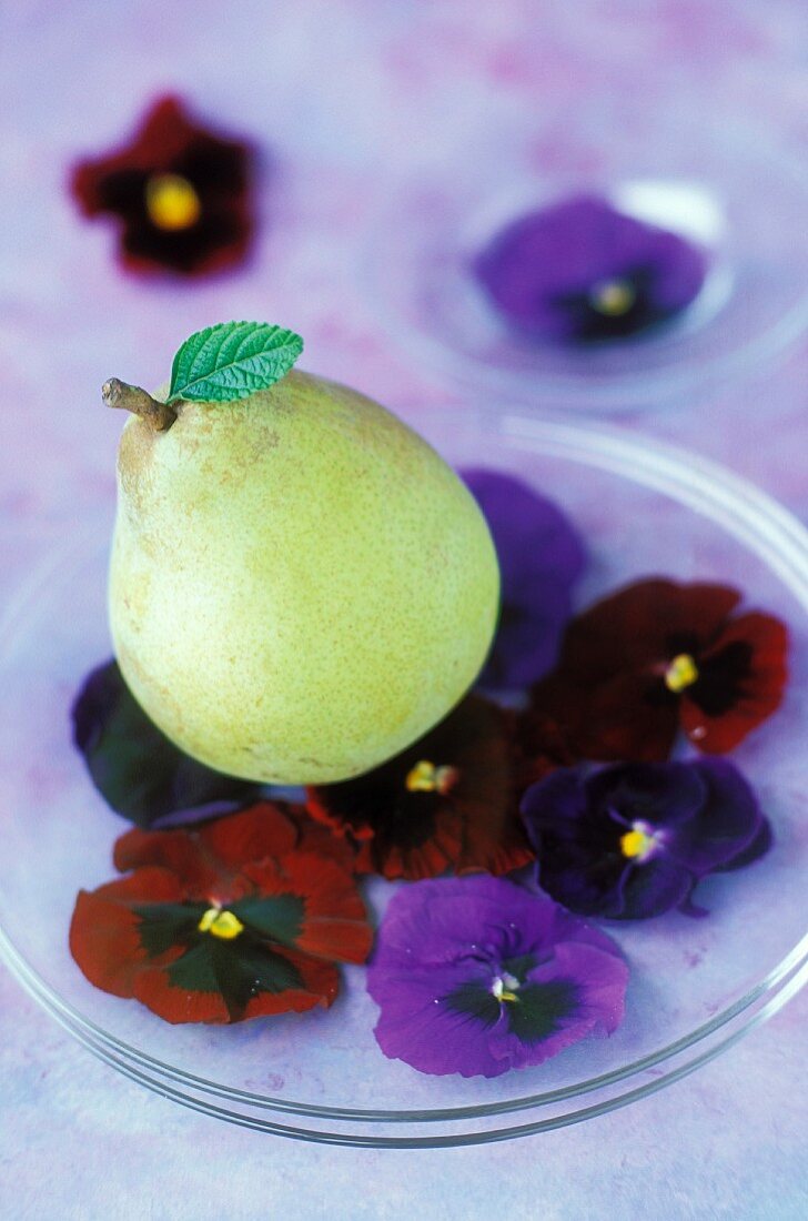 A pear and pansies
