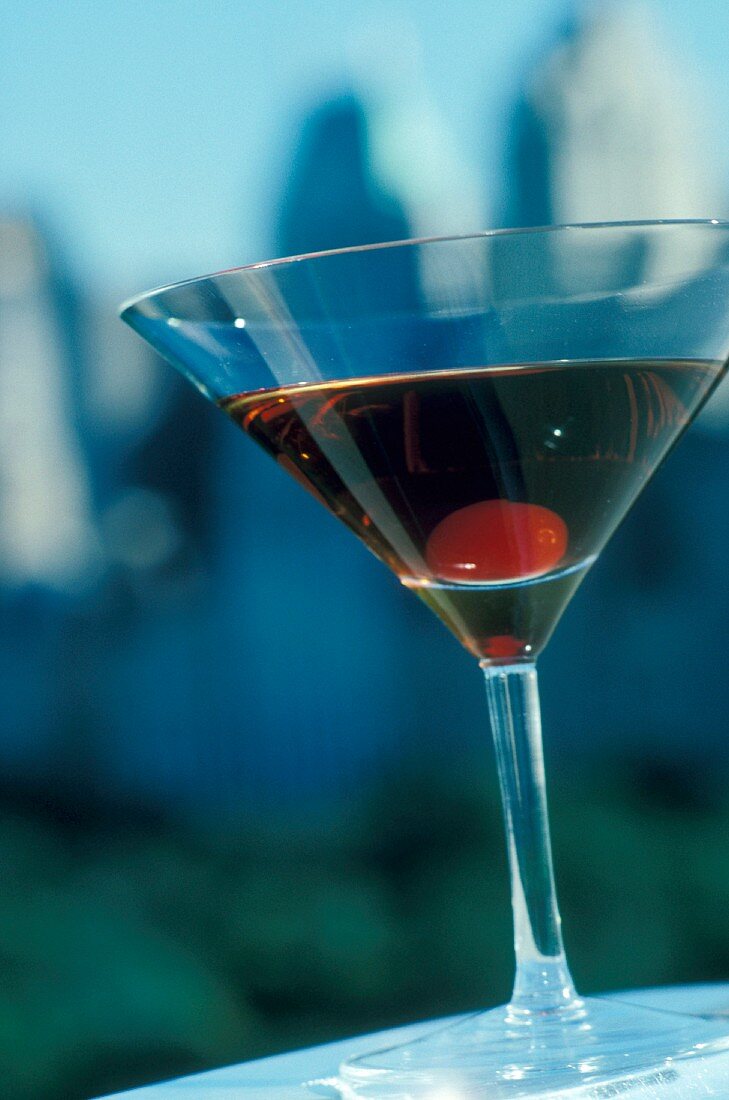 A Manhatten (cocktail with whisky and red Vermouth)