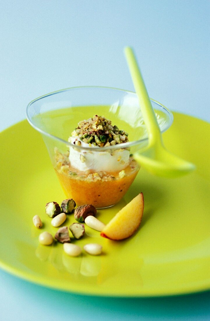 Petit-suisse with peach coulis and dried fruit