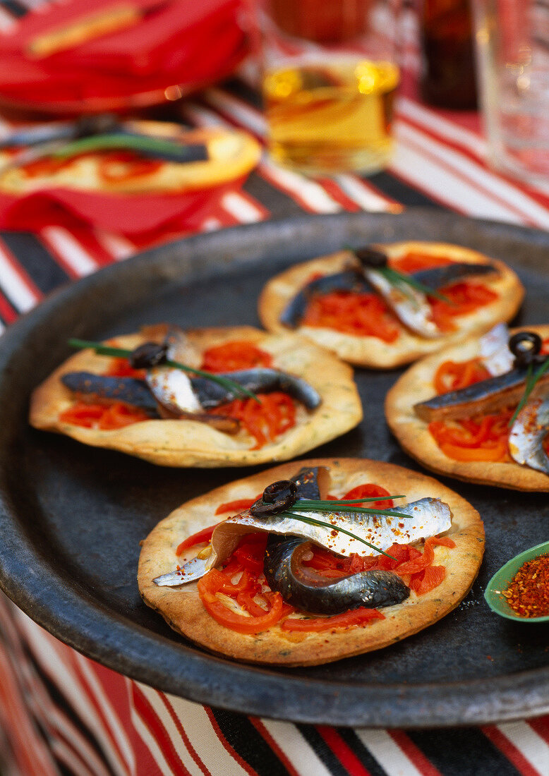 Mini anchovy pizzas
