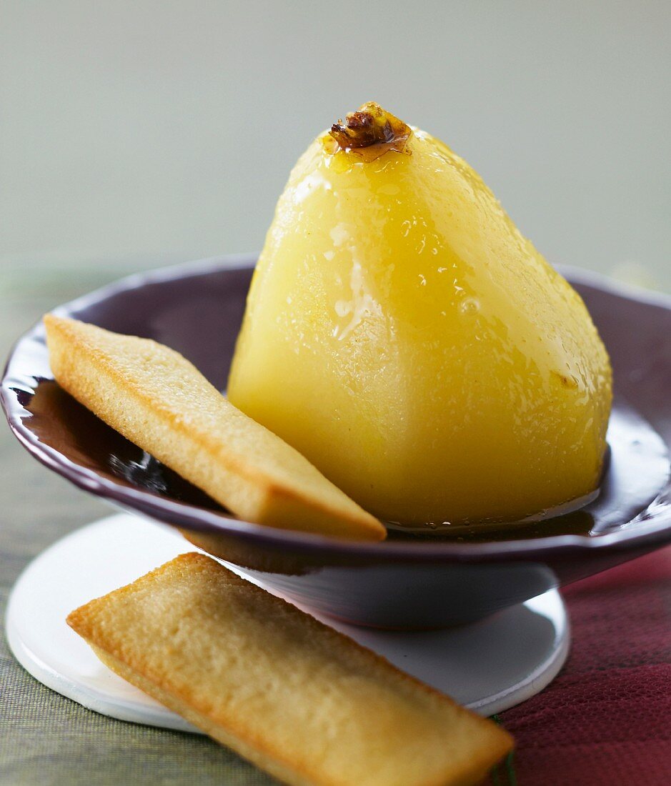 Pear poached in Indian tea and green tea financiers