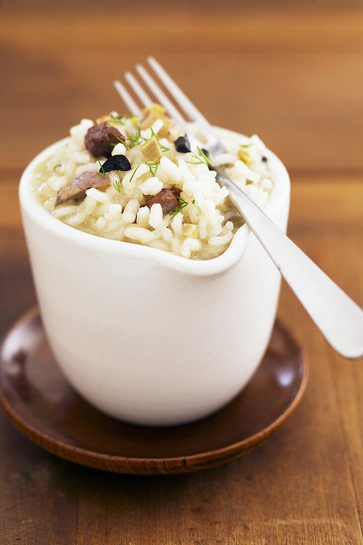 Risotto mit Täubchen und Oliven