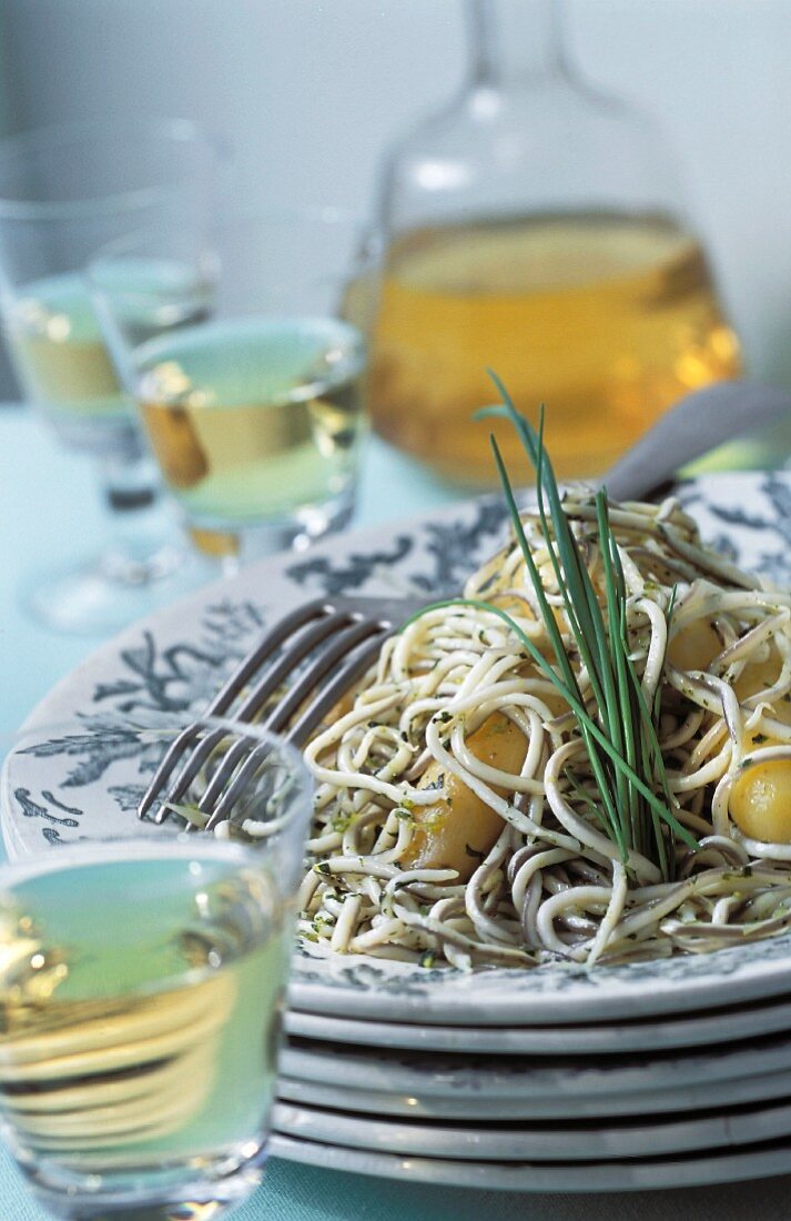 Cooked glass eel with potatoes