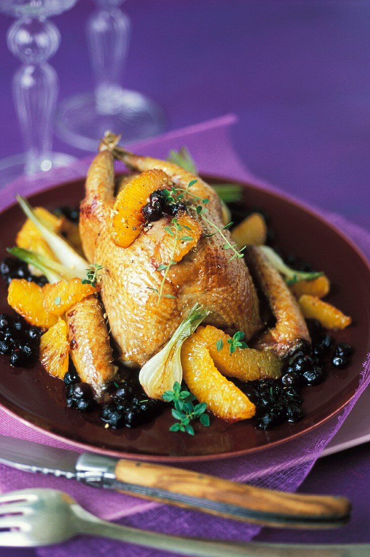 Pigeon with orange and blackcurrants