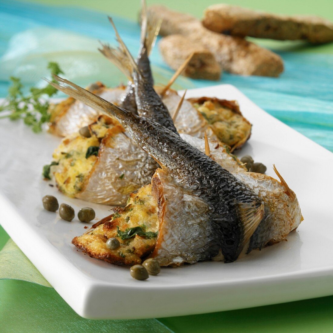 Stuffed sardines with potatoes and capers