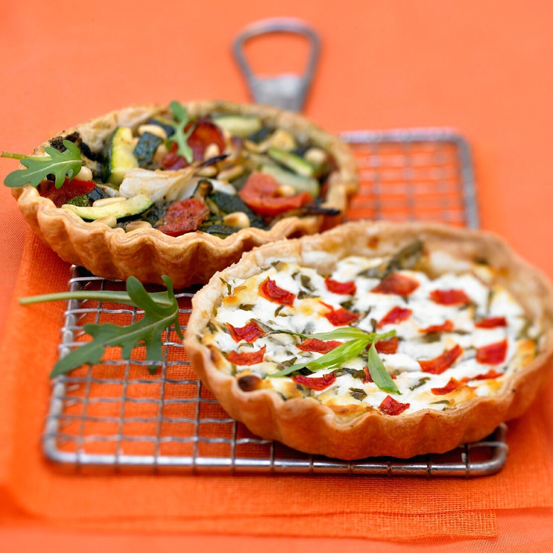 Goat's cheese and tarragon quiche,vegetable and tapenade tartlet