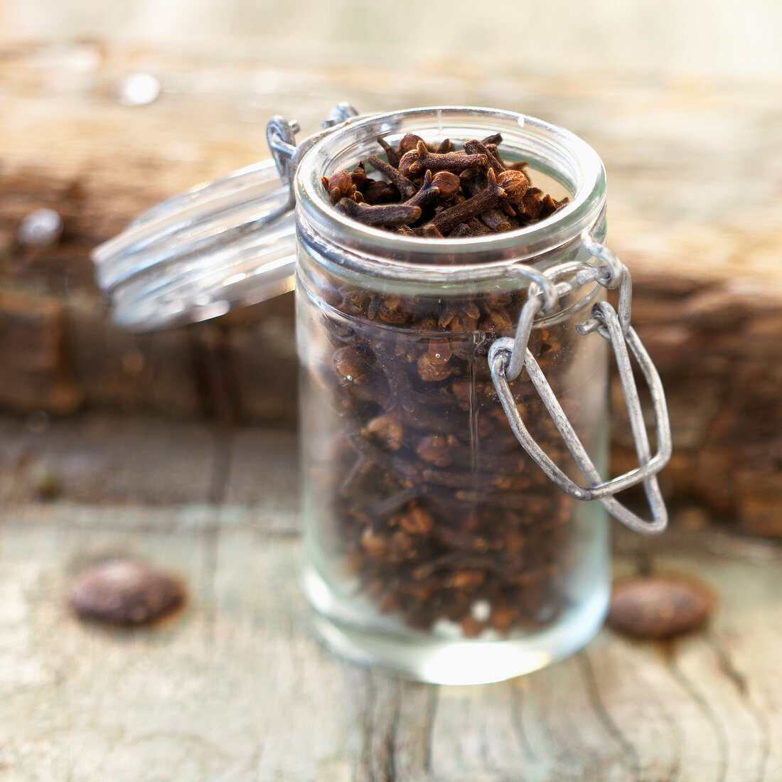 Small glass jar of cloves