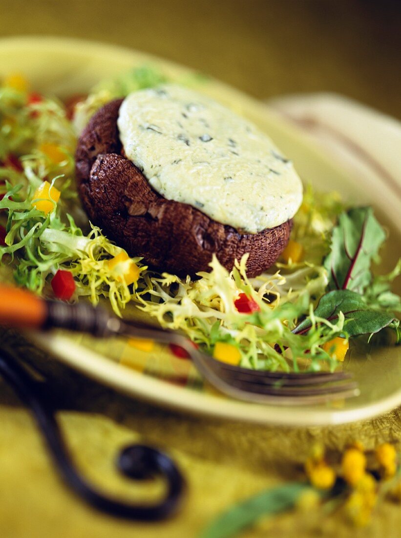 A stuffed mushroom with Roquefort sauce