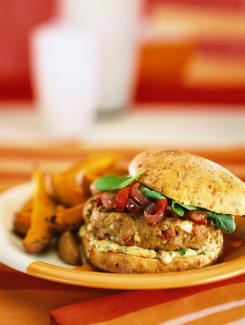 A chicken burger with red onions