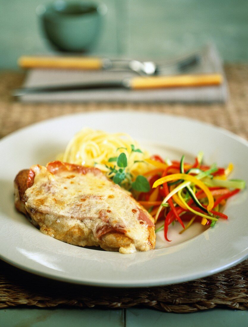 Gratinated veal escalope with ham and cheese