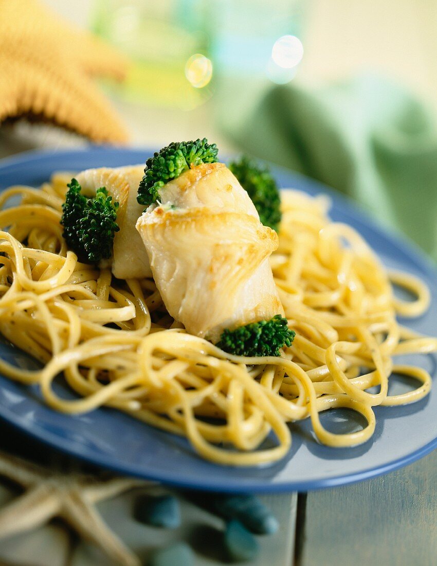 Whiting roulade filled with broccoli on linguine