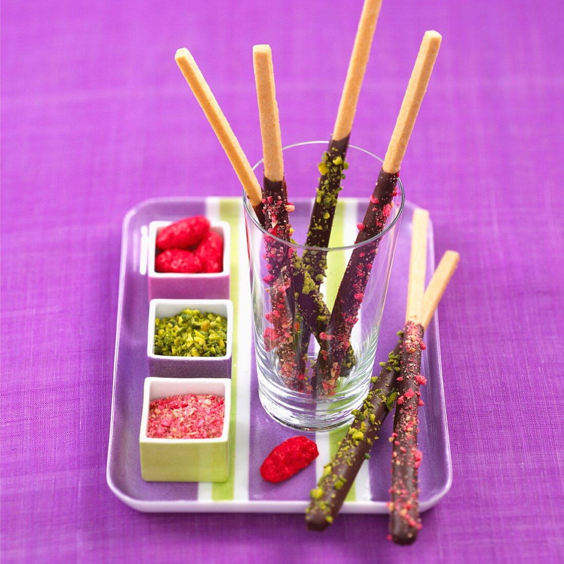 Mikado chocolate sticks with coloured sprinkles