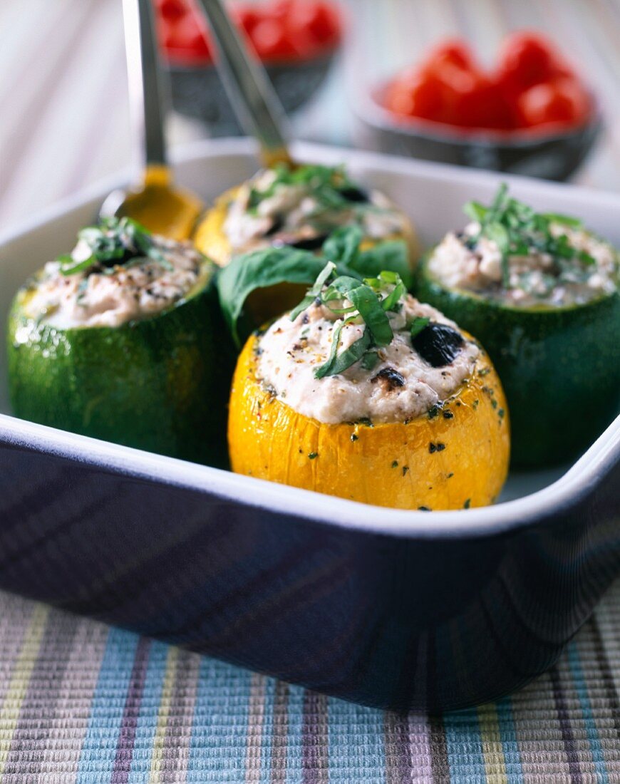 yellow and green courgettes stuffed with fromage frais and herbs