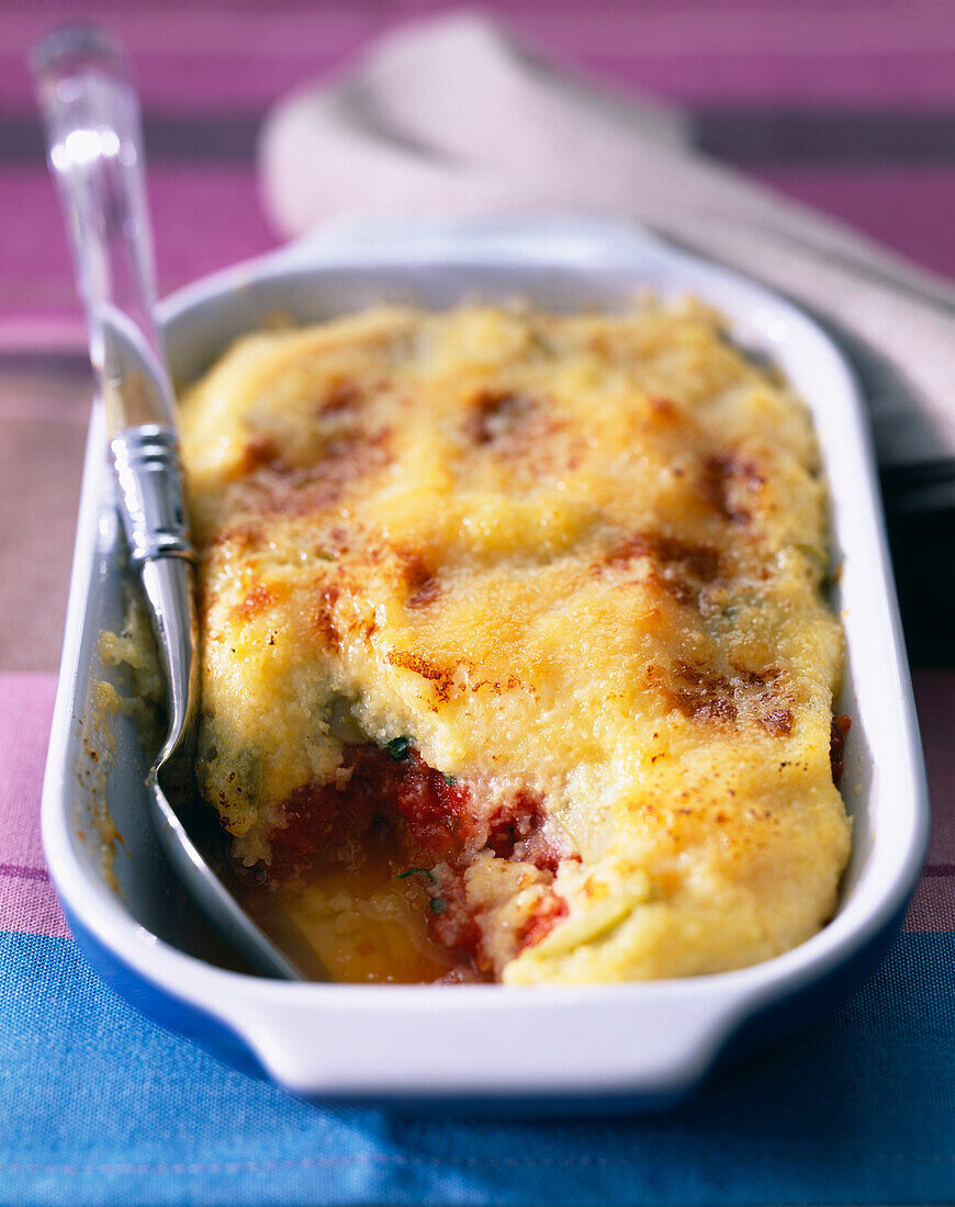 Gratin with pumpkin puree topping